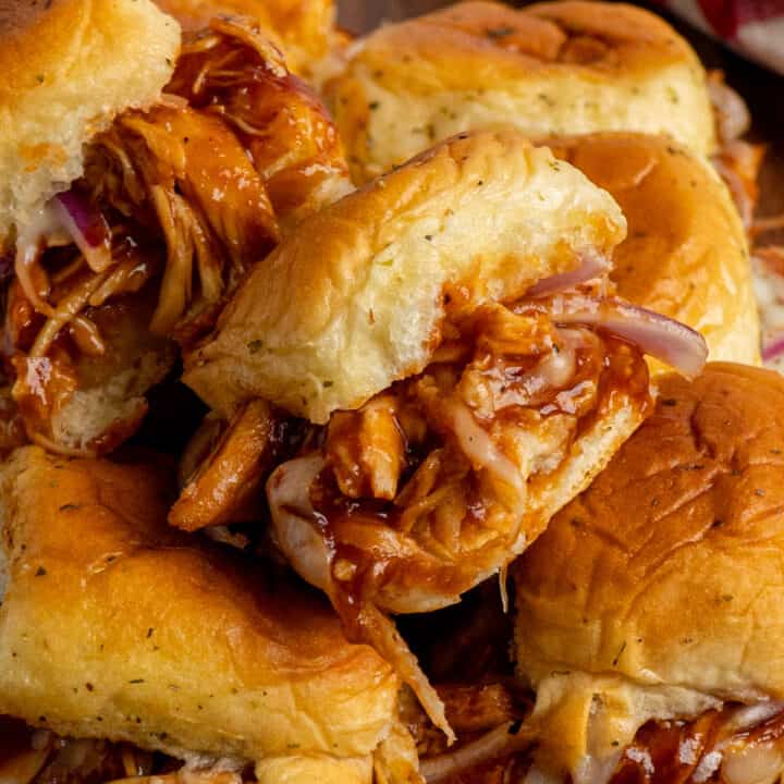 BBQ chicken sliders stacked up on top of each other