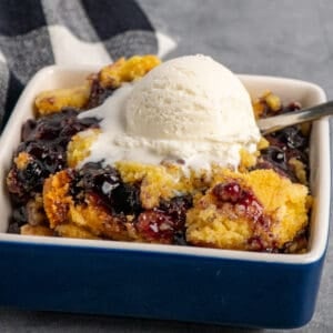 Crock pot blueberry cobber with ice cream on top