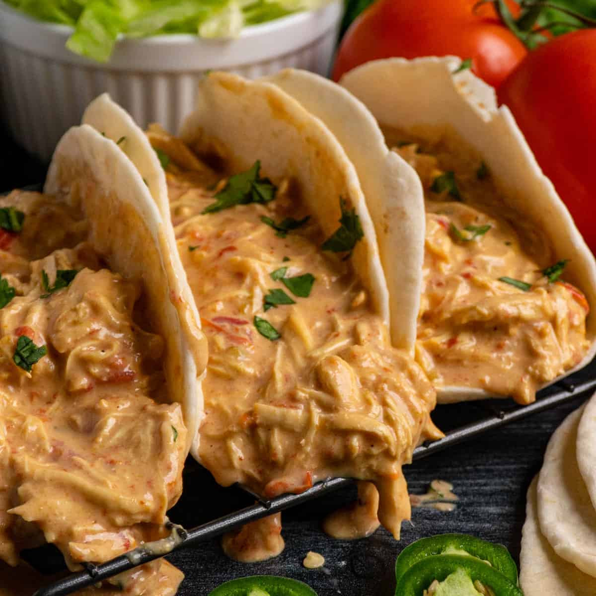 Close up of slow cooker chicken queso tacos