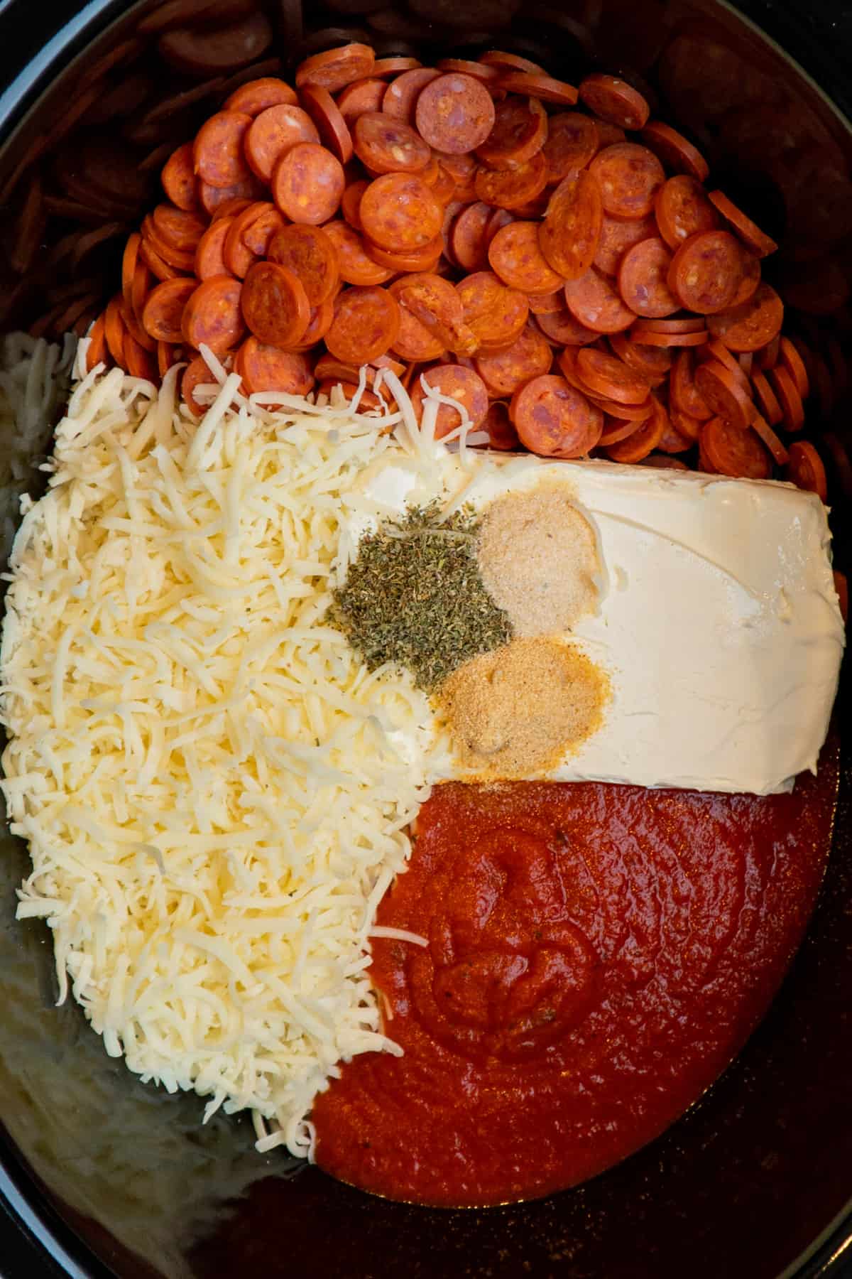 All the ingredients to make crock pot pizza dip
