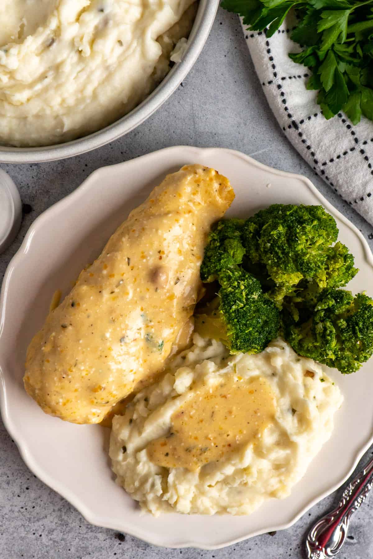 Overhead look at ranch chicken on a plate with mashed potatoes.