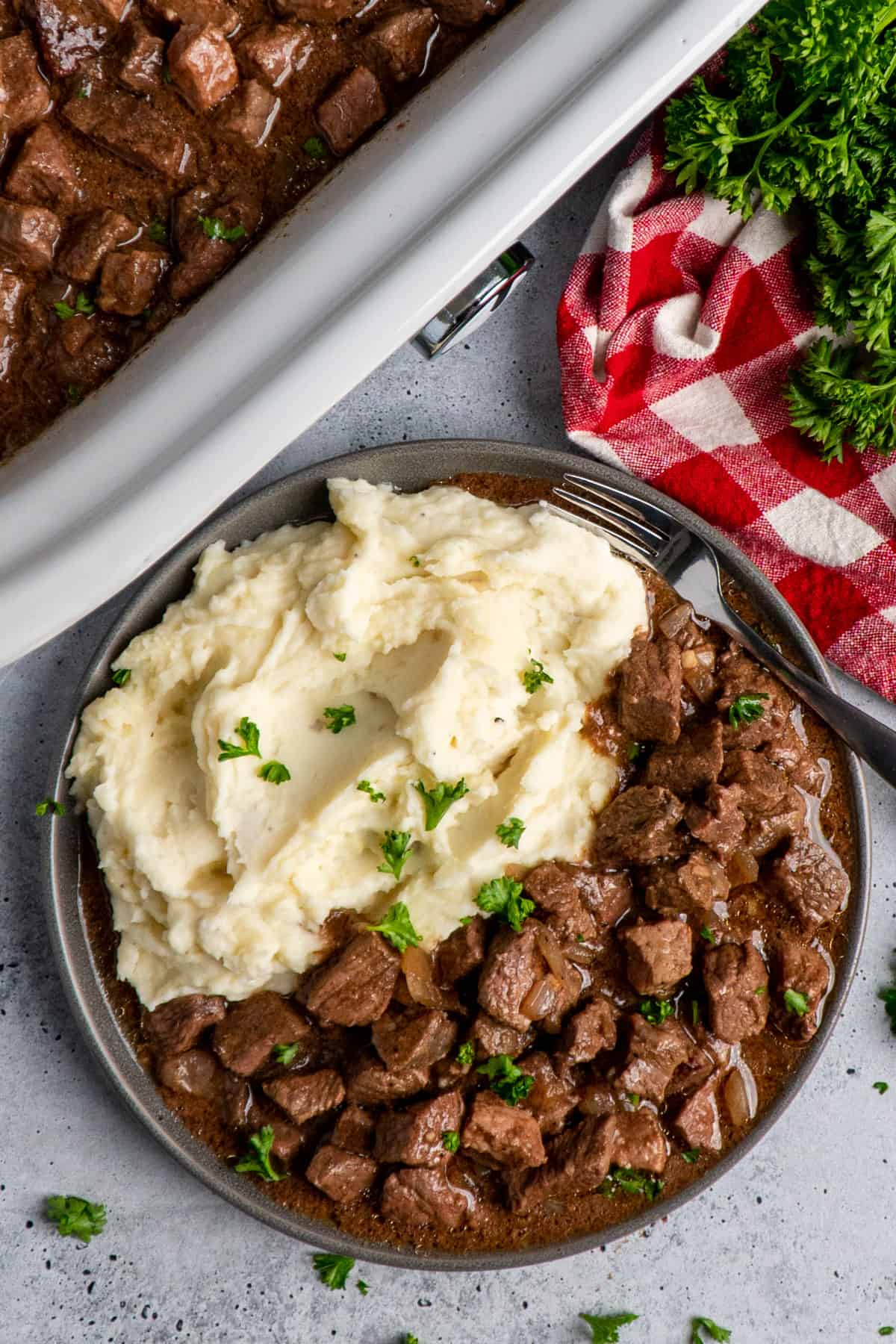 Overhead look at steak bites with garlic mashed potatoes.