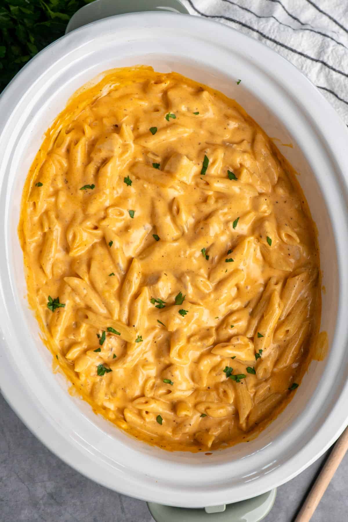 Overhead look at buffalo chicken pasta in a slow cooker.