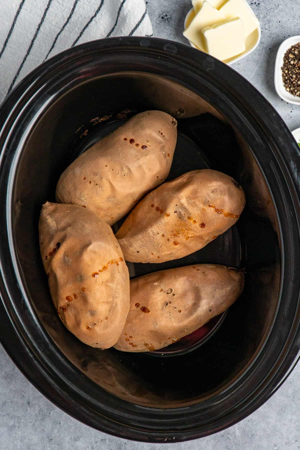Sweet potatoes being cooked in a slow cooker.