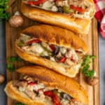 Chicken Philley Cheesesteak on a wood cutting board.