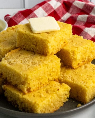 Crock pot cornbread stacked on top of each other.