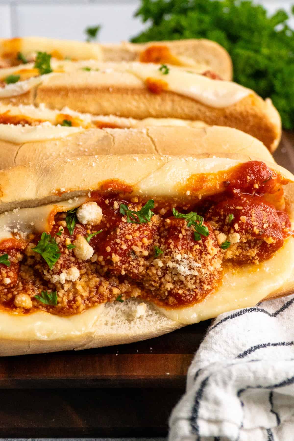 A close up of a meatball sub on its side.