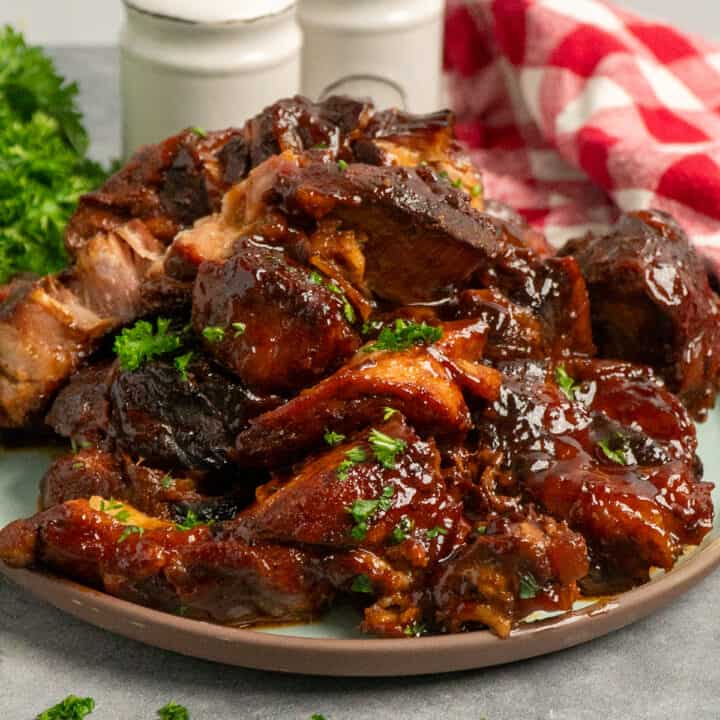 Crock pot country style boneless pork ribs on a plate.