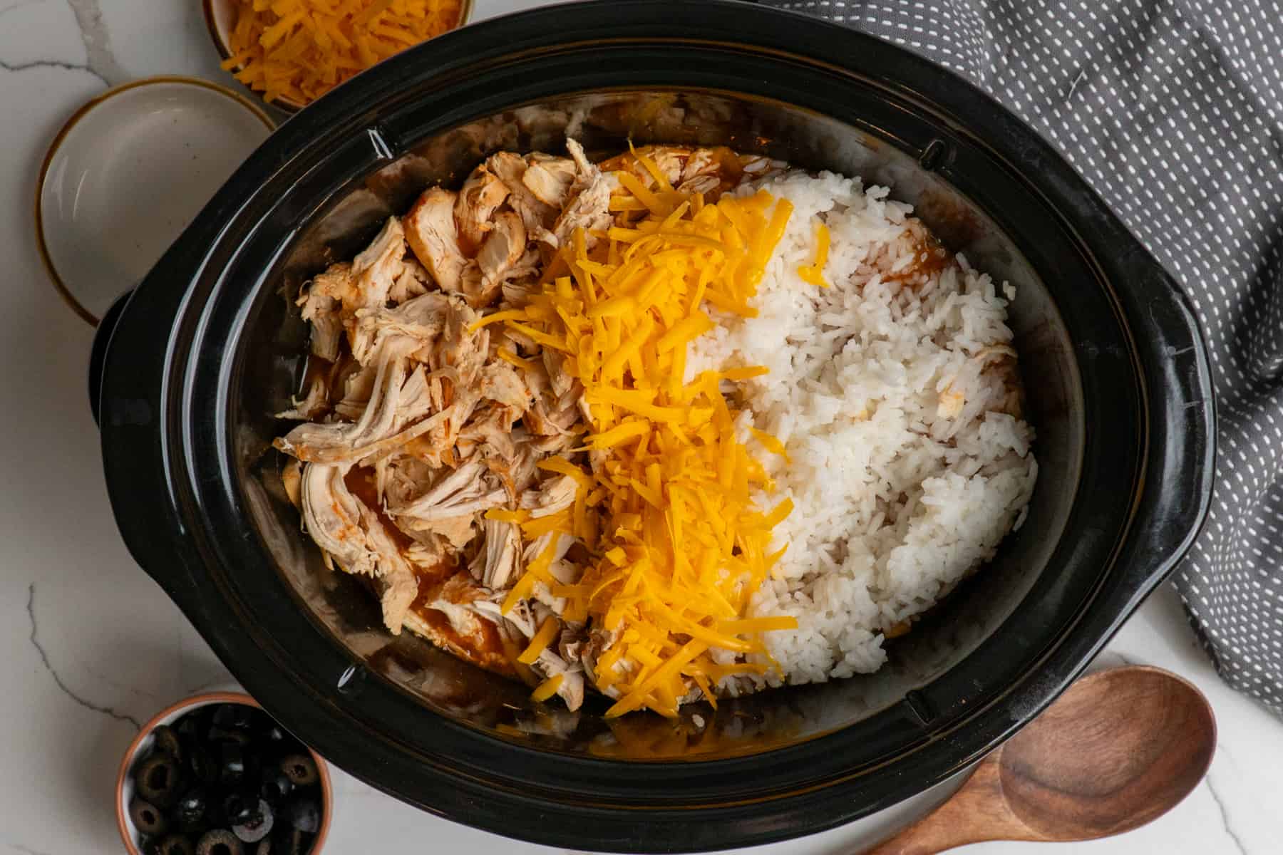 Chicken, cheese and rice in a crock pot.