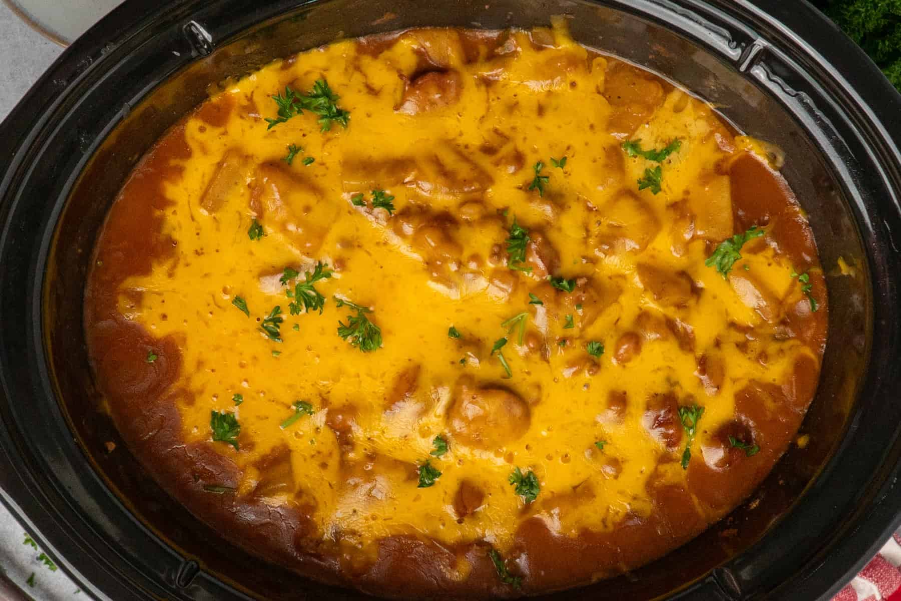 Melted cheese on top of cowboy casserole.