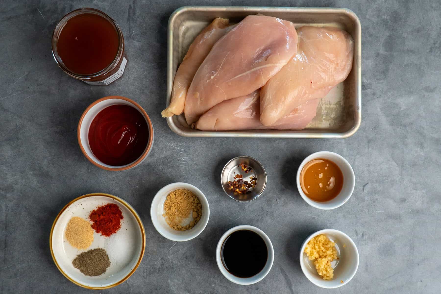 Raw ingredients to make apricot chicken.