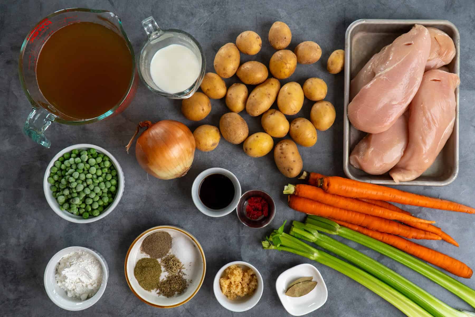 Ingredients on the counter to make a slow cooker chicken stew before making. 