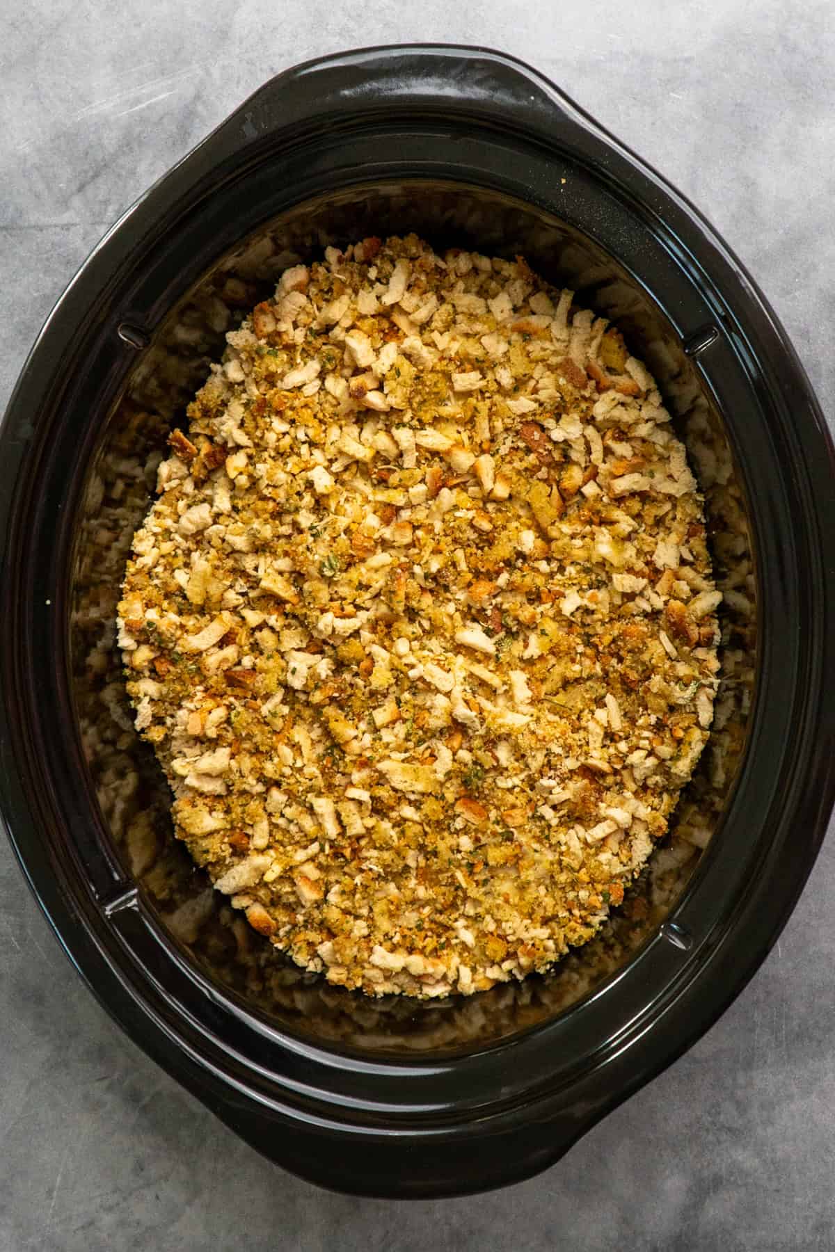 Chicken cordon bleu ready to be cooked in a slow cooker.