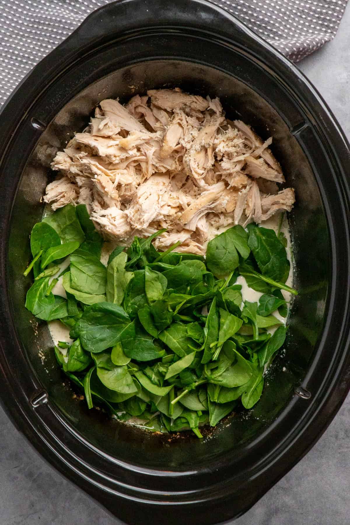 Shredded chicken and spinach added to the creamy lemon sauce.