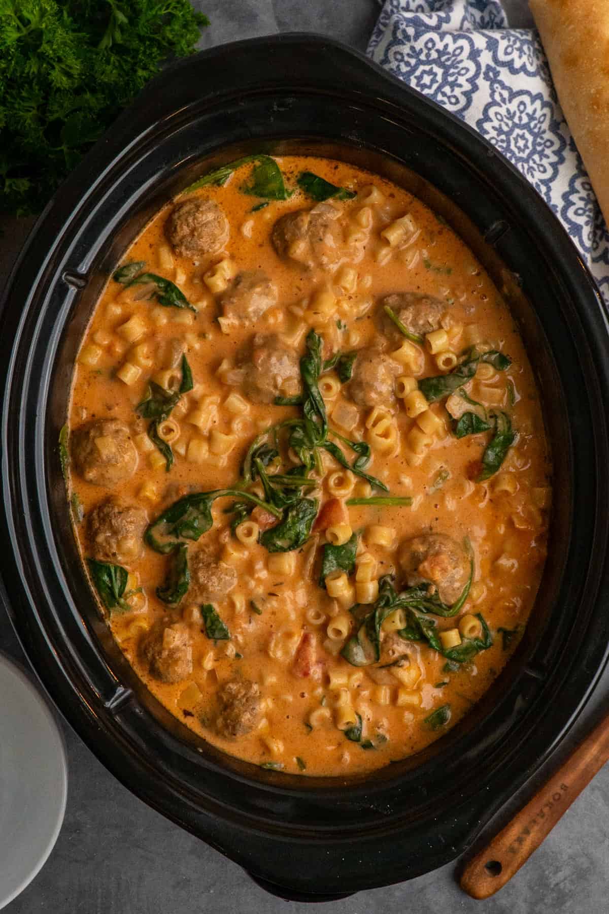 Meatball soup in a slow cooker ready to be served.