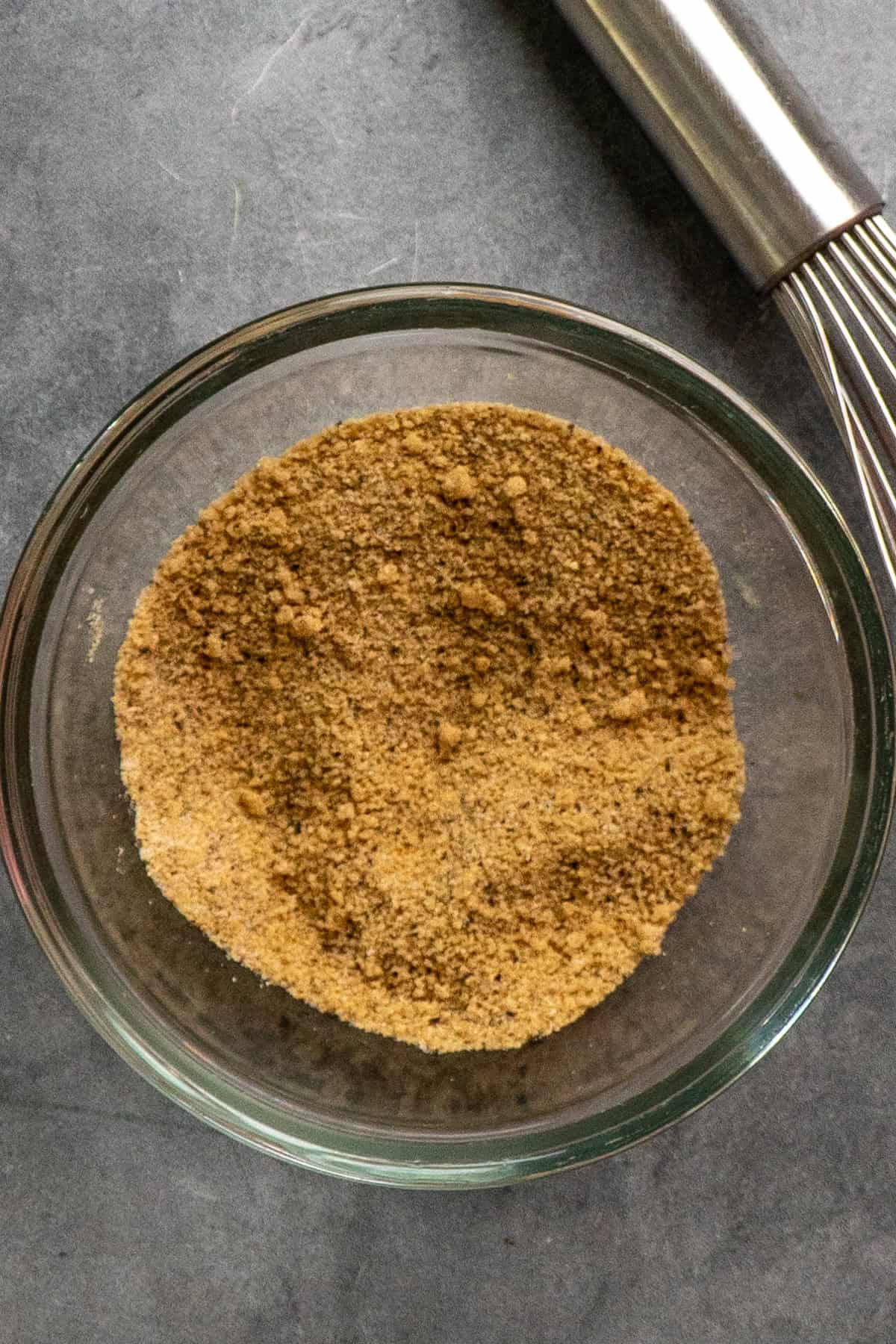 Rub spices mixed in a glass bowl.