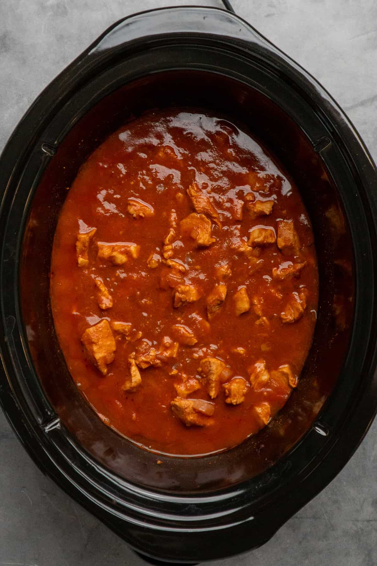 Cooked tikka masala before adding heavy cream and cornstarch.