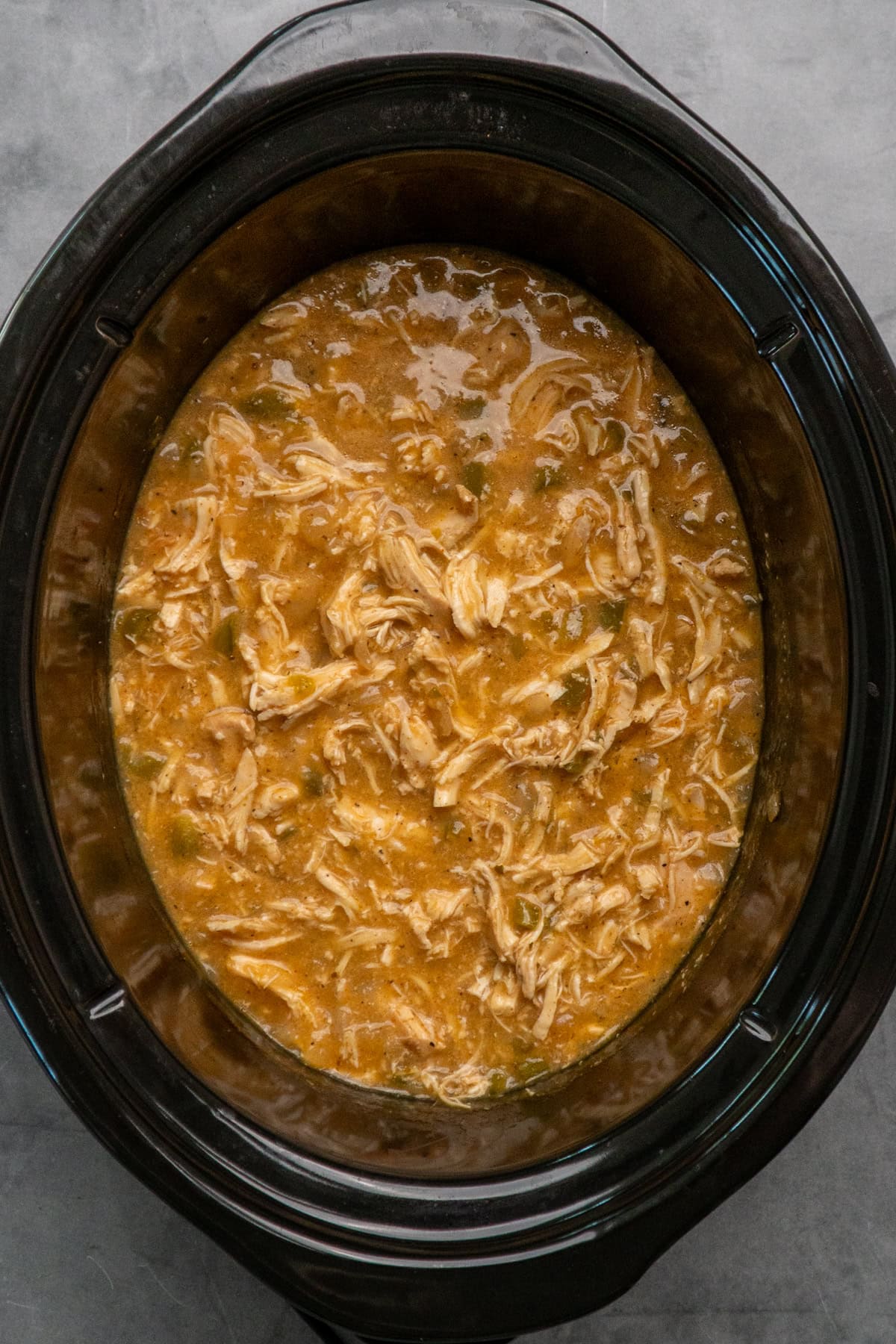 chicken shredded and mix in a gravy sauce in the crock pot.