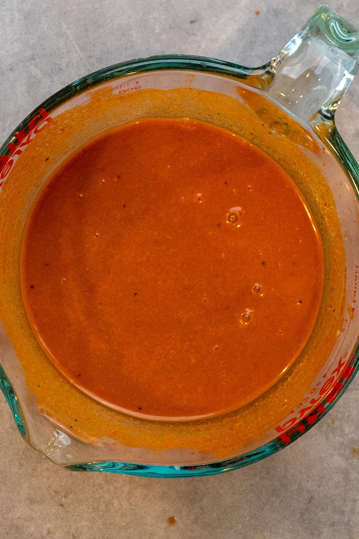 Sauce mixed in a measuring cup.