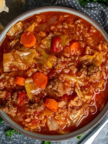 Slow cooker cabbage roll soup in a bowl.