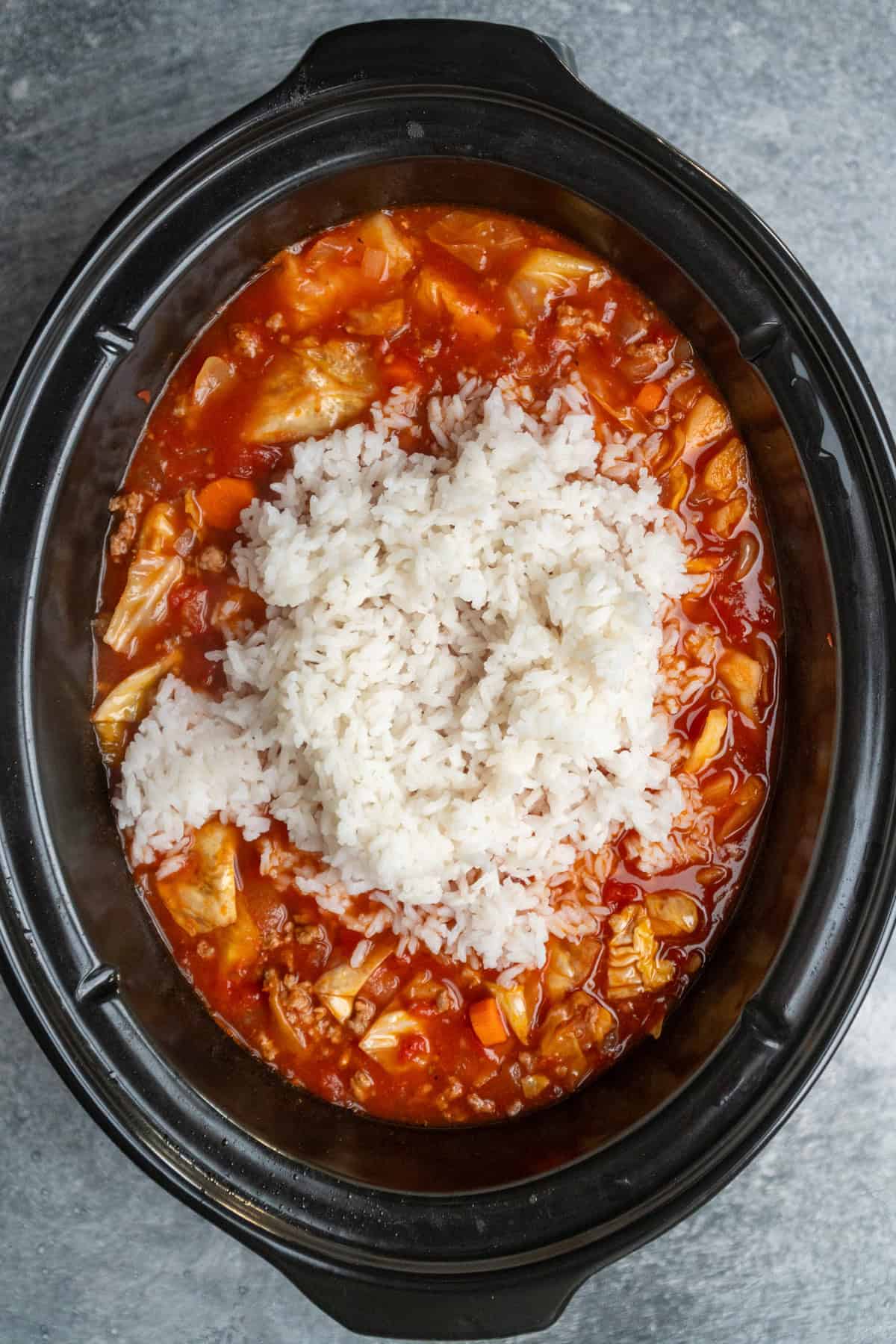 Cooked rice added to the cabbage roll soup.