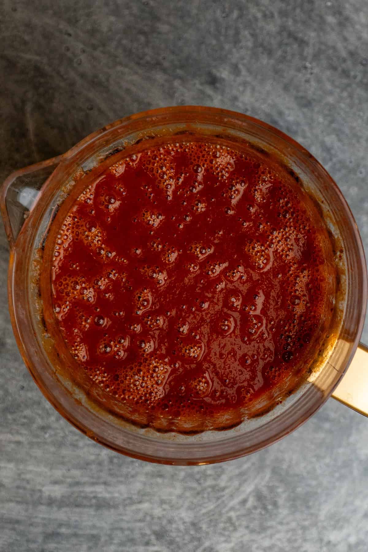 Birria sauce ingredients mixed together in a blender.