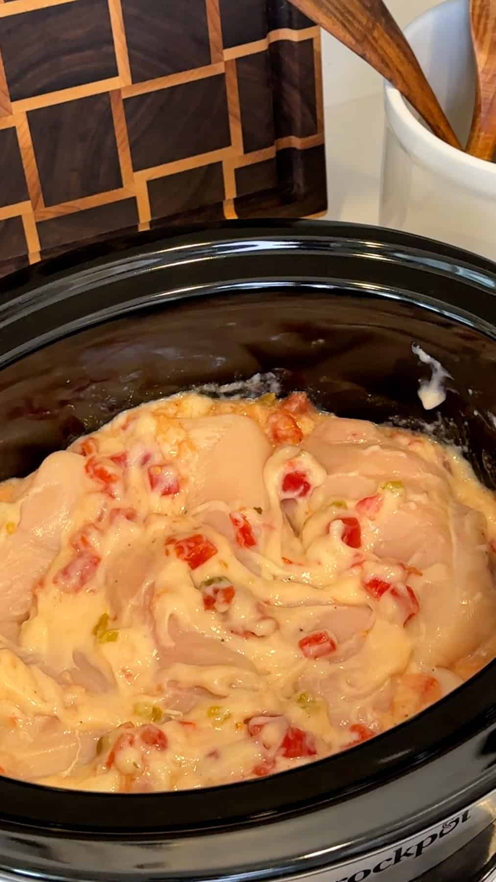 Chicken breasts added to the cheese sauce and coated ready to cook.