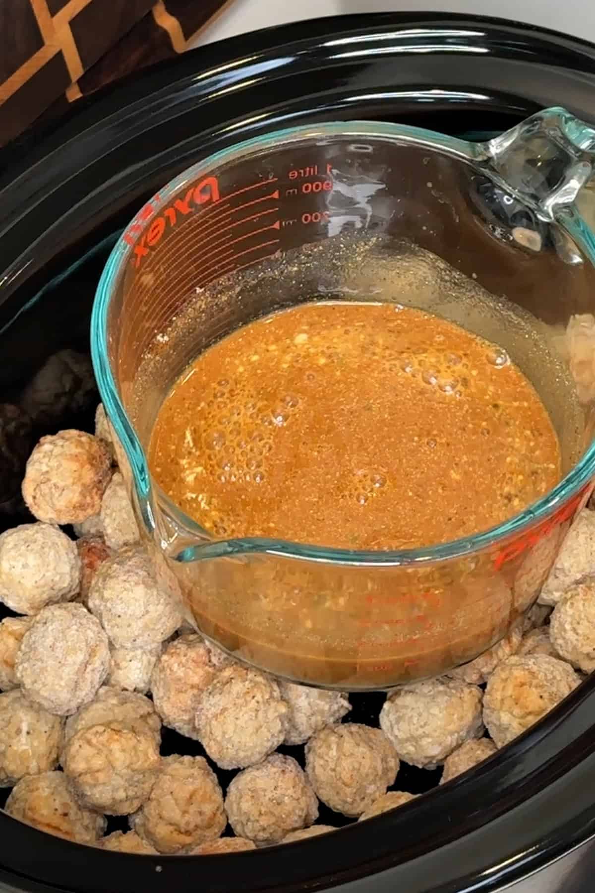 Mississippi sauce mixed together in a measuring cup.