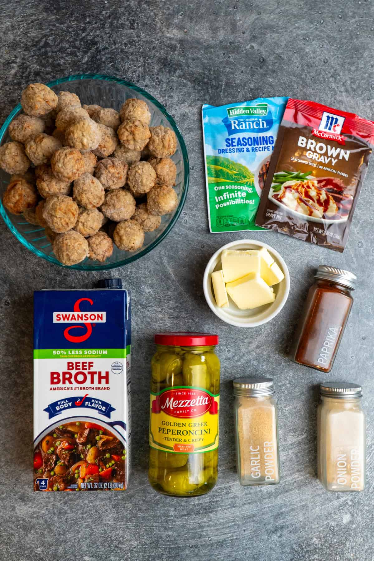 Ingredients to make Mississippi meatballs on a gray countertop.