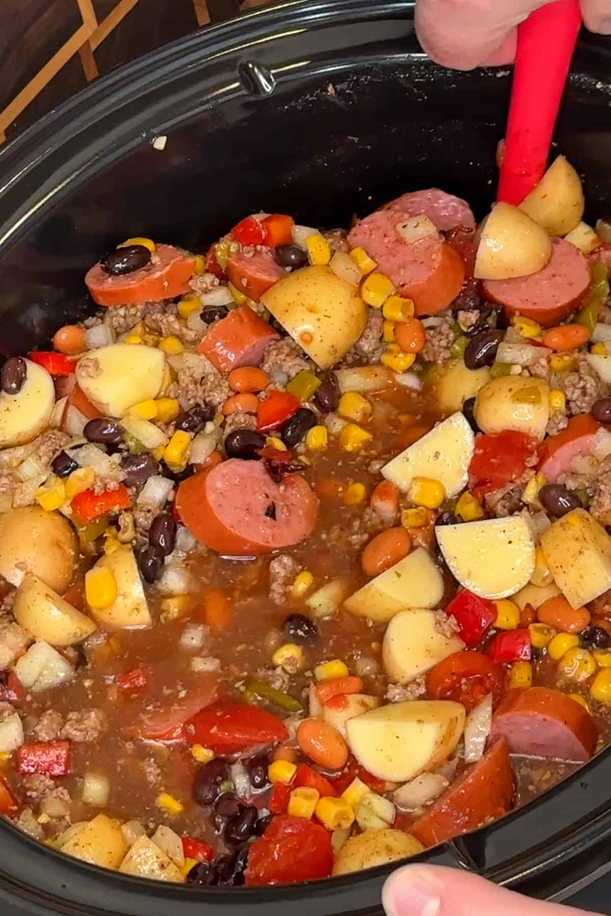 All the ingredients for cowboy soup added to the crock pot.