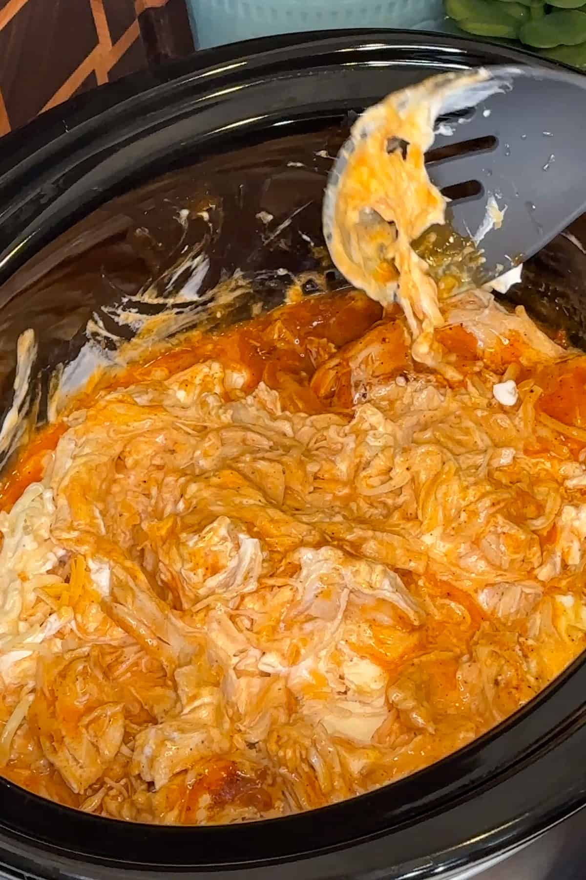 Cream cheese, blue cheese dressing, sour cream and shredded chicken added to the buffalo sauce.